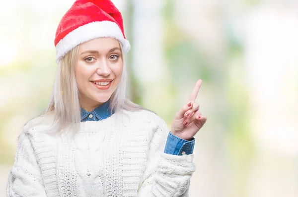 Jovem Loira Vestindo Chapéu Natal Sobre Fundo Isolado Com Grande — Fotografia de Stock