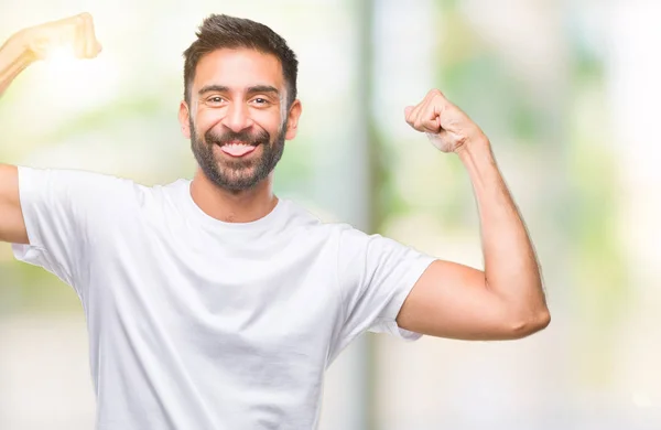 Hombre Hispano Adulto Sobre Fondo Aislado Mostrando Los Músculos Los — Foto de Stock