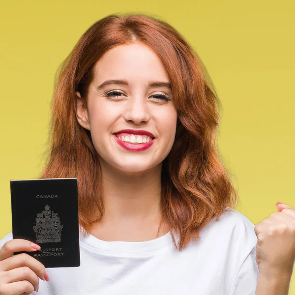 Joven Hermosa Mujer Sosteniendo Pasaporte Canadá Sobre Fondo Aislado Gritando — Foto de Stock