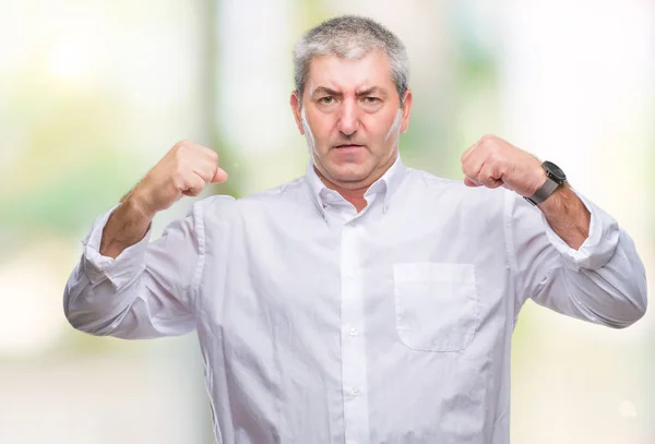 Hombre Mayor Guapo Sobre Fondo Aislado Mostrando Los Músculos Los —  Fotos de Stock