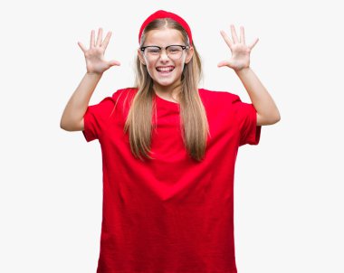 Young beautiful girl wearing glasses over isolated background showing and pointing up with fingers number ten while smiling confident and happy. clipart