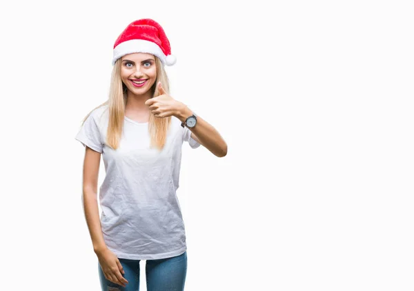 Νέοι Όμορφη Ξανθιά Γυναίκα Χριστουγεννιάτικο Καπέλο Πέρα Από Απομονωμένο Υπόβαθρο — Φωτογραφία Αρχείου