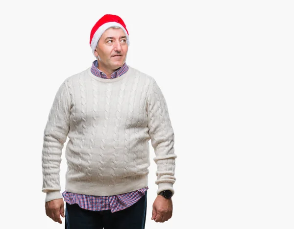 Bonito Homem Sênior Vestindo Chapéu Natal Sobre Fundo Isolado Sorrindo — Fotografia de Stock
