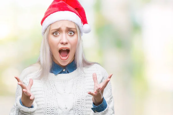 Junge Blonde Frau Mit Weihnachtsmütze Über Isoliertem Hintergrund Verrückt Und — Stockfoto