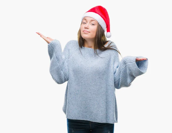 Mooie Kaukasische Jongedame Kerstmuts Dragen Geïsoleerde Achtergrond Clueless Verward Expressie — Stockfoto