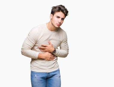 Genç yakışıklı adam izole mide üzerinde el ile arka plan çünkü mide bulantısı, ağrılı hastalık hasta hissediyor. Ağrısı kavramı.