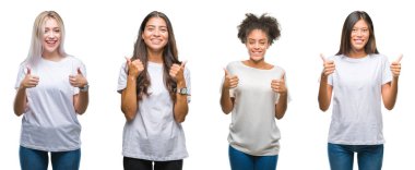 Kolaj Grubu'nun el ile pozitif jest yapıyor izole arka plan başarı işareti başparmak gülümseyen ve mutlu Çin, Arap, Afrikalı-Amerikalı kadın. Neşeli bir ifadeyle, kazanan jest kameraya bakıyor.