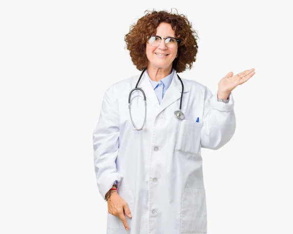 Middle Ager Senior Doctor Woman Isolated Background Smiling Cheerful Presenting — Stock Photo, Image