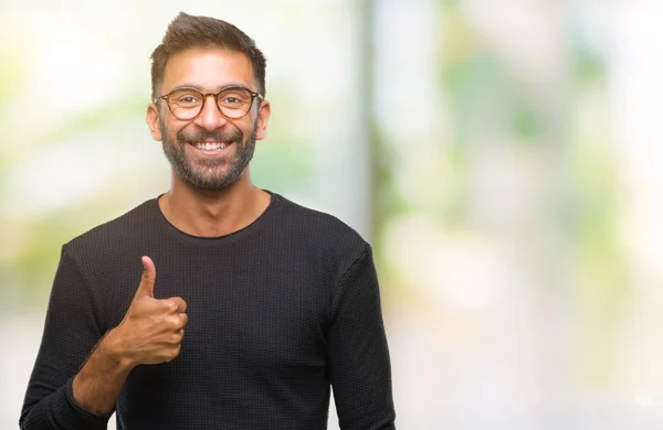 Adult Hispanic Man Wearing Glasses Isolated Background Doing Happy Thumbs — Stock Photo, Image