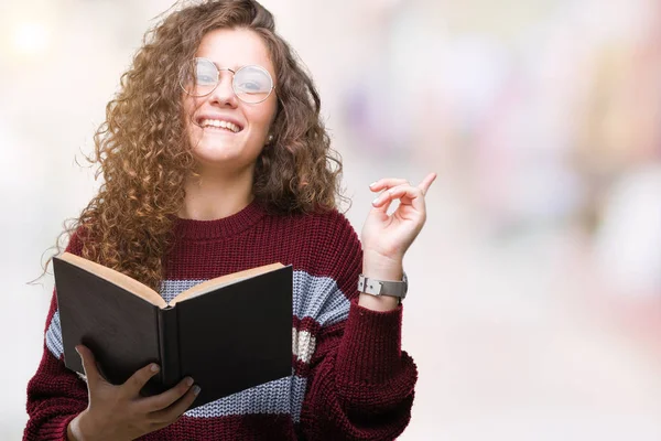 Young Brunette Girl Reading Book Wearing Glasses Isolated Background Very — Stock Photo, Image