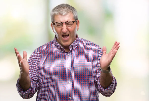 Handsome Senior Man Wearing Glasses Isolated Background Celebrating Mad Crazy — Stock Photo, Image