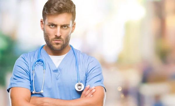 Young Handsome Doctor Nurse Man Isolated Background Skeptic Nervous Disapproving — Stock Photo, Image