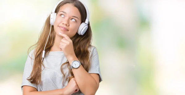 Young Beautiful Woman Wearing Headphones Listening Music Isolated Background Hand — Stock Photo, Image