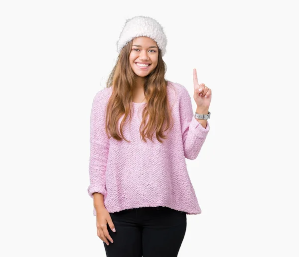 Junge Schöne Brünette Frau Trägt Pullover Und Wintermütze Über Isoliertem — Stockfoto