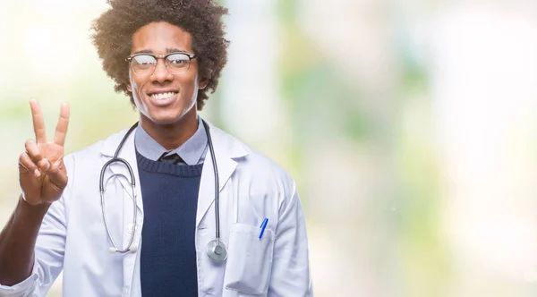 Afro American Doctor Man Isolated Background Showing Pointing Fingers Number — Stock Photo, Image