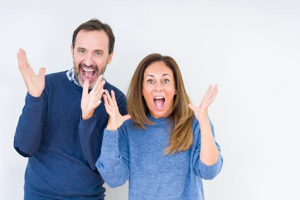 Beautiful Middle Age Couple Love Isolated Background Celebrating Crazy Amazed — Stock Photo, Image