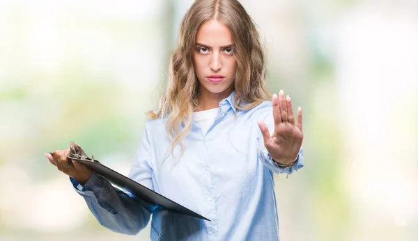 Beautiful Young Blonde Business Woman Holding Clipboard Isolated Background Open — Stock Photo, Image