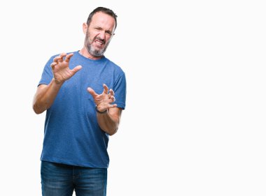 Orta yaş ağarmış komuta sizde izole arka plan üzerinde tiksinti ifadesi, memnun ve korkulu tiksinti yüz yapıyorsun çünkü nefret tepki. Elleriyle kaldırdı. Sinir bozucu kavramı.