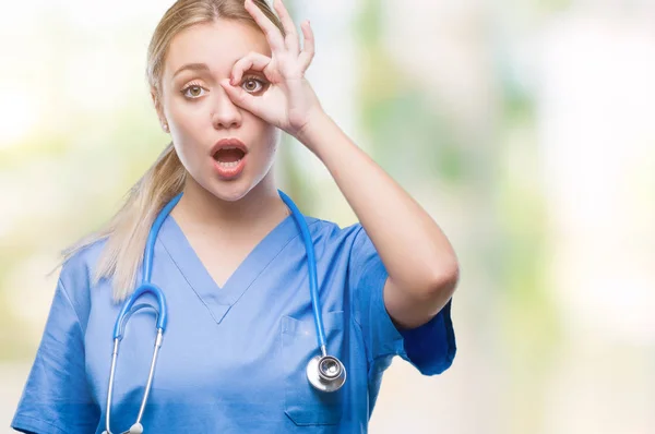 Young Blonde Surgeon Doctor Woman Isolated Background Doing Gesture Shocked — Stock Photo, Image