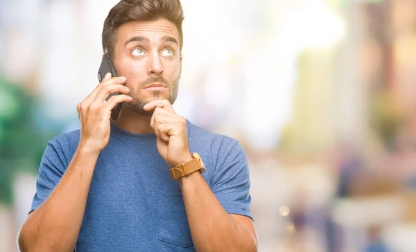 Joven Hombre Guapo Hablando Teléfono Inteligente Sobre Fondo Aislado Cara — Foto de Stock