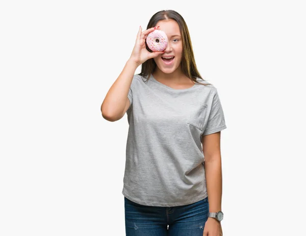 Joven Mujer Caucásica Comiendo Donut Dulce Sobre Fondo Aislado Con —  Fotos de Stock