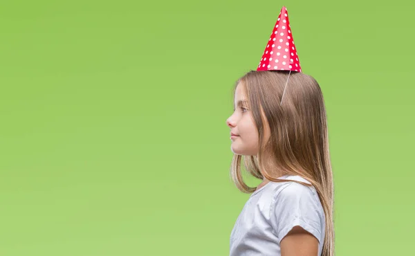 Young Beautiful Girl Wearing Birthday Cap Isolated Background Looking Side — Stock Photo, Image