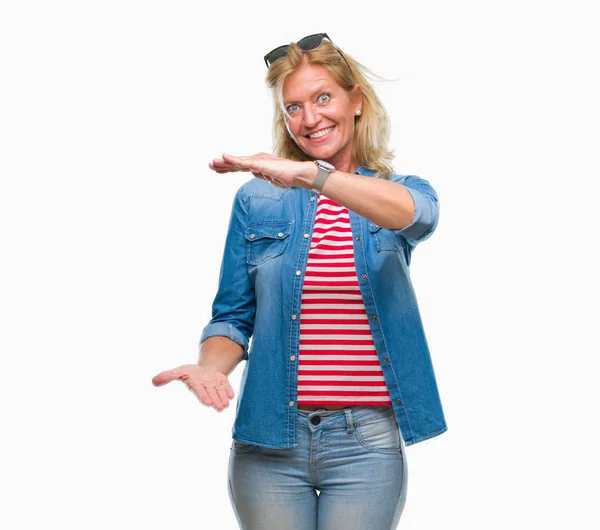 Middle Age Blonde Woman Isolated Background Gesturing Hands Showing Big — Stock Photo, Image