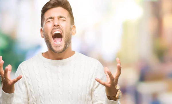 Joven Hombre Guapo Con Suéter Invierno Sobre Fondo Aislado Loco —  Fotos de Stock