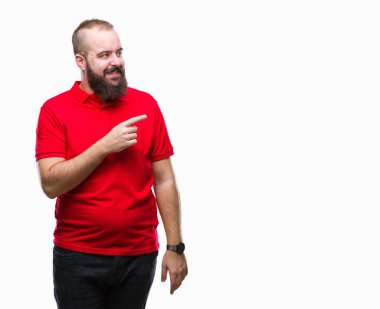 İzole arka neşeli bir gülümseme ile el ve parmak kadar kameraya bakarak yüzündeki mutlu ve doğal ifade ile yan ile işaret yüz üzerinden kırmızı gömlek giyen genç beyaz hipster adam.