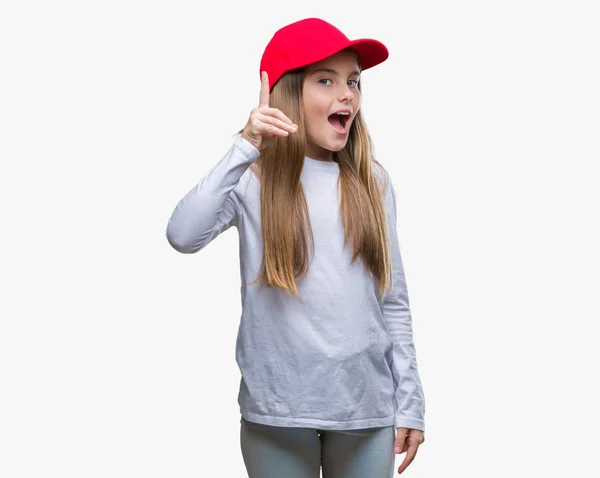 Joven Hermosa Chica Con Gorra Roja Fondo Aislado Señalando Dedo —  Fotos de Stock