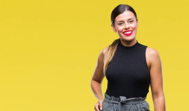 Genç güzel şık iş kadını yüzünde mutlu ve güzel bir gülümseme ile izole arka plan üzerinde. Şanslı kişi.