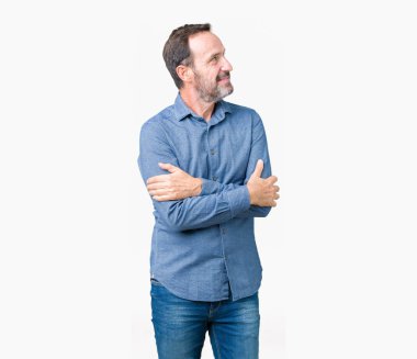 İkna ve kendinden emin yakışıklı orta yaş zarif komuta sizde tarafına silahlarla seyir gülümseyen izole arka plan üzerinde çarpı işareti