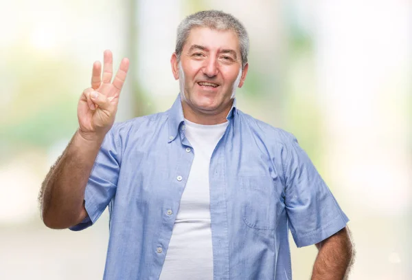 孤立した背景表示と指で上向きにハンサムな年配の男性番号自信を持って 幸せな笑みを浮かべている間 — ストック写真