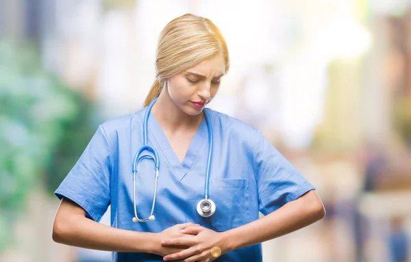 以上の若い美しい金髪の医者の外科医看護師女性のための胃に手でバック グラウンドを分離した消化不良 気分が悪く痛みを伴う病気 痛みの概念 — ストック写真