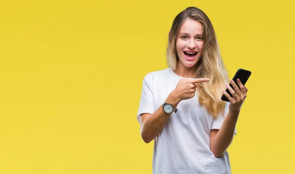 Genç Güzel Sarışın Kadın Smartphone Izole Arka Parmak Ile Işaret — Stok fotoğraf