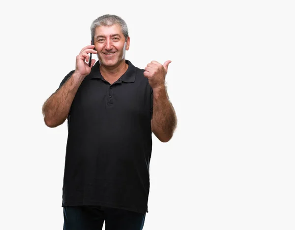 Handsome Senior Man Talking Smartphone Isolated Background Pointing Showing Thumb — Stock Photo, Image