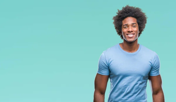 Afro american man over isolated background with a happy and cool smile on face. Lucky person.