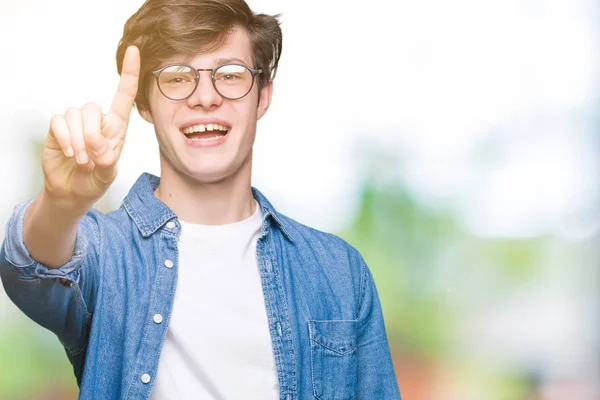 Young Handsome Man Wearing Glasses Isolated Background Showing Pointing Finger — Stock Photo, Image