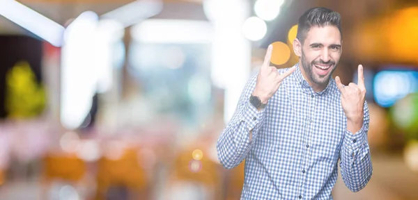 Young Handsome Man Isolated Background Shouting Crazy Expression Doing Rock — Stock Photo, Image