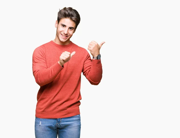 Young Handsome Man Isolated Background Pointing Back Hand Thumbs Smiling — Stock Photo, Image