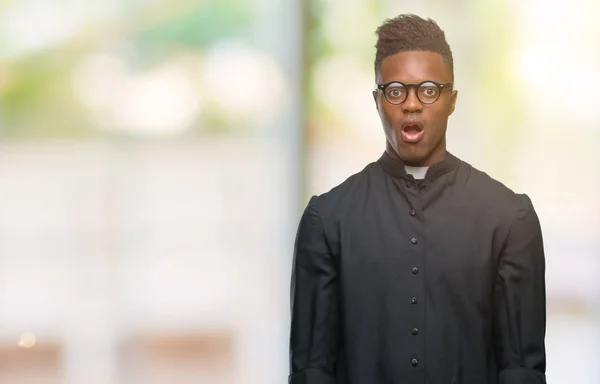Young African American Priest Man Isolated Background Afraid Shocked Surprise — Stock Photo, Image