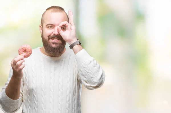 Jeune Homme Hipster Caucasien Mangeant Beignet Sucré Sur Fond Isolé — Photo