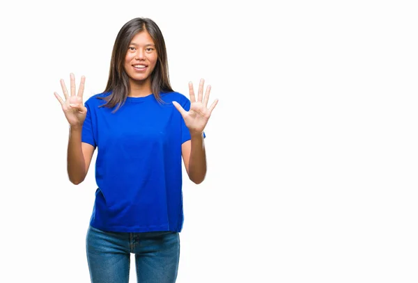 Молодая Азиатская Женщина Изолированном Фоне Показывает Указывает Пальцами Номер Девять — стоковое фото