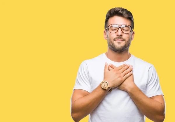 Junger Gutaussehender Mann Mit Brille Vor Isoliertem Hintergrund Lächelnd Die — Stockfoto