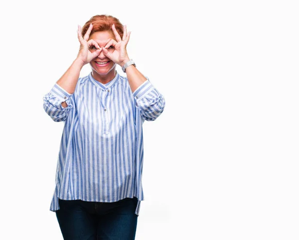 Atrractive Senior Caucasian Redhead Woman Isolated Background Doing Gesture Binoculars — Stock Photo, Image