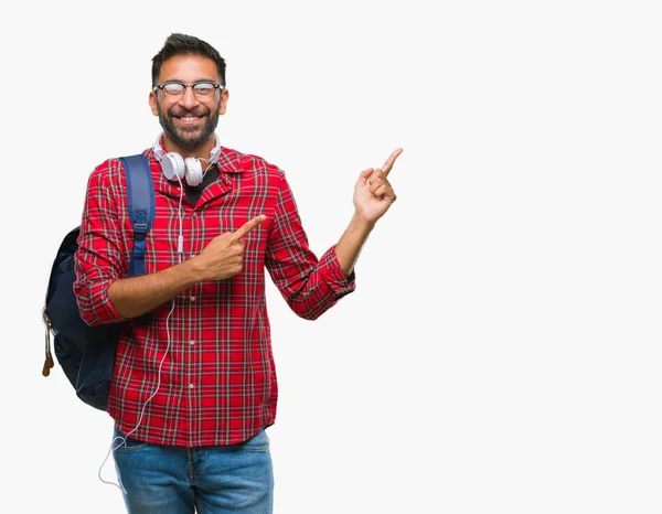 Estudiante Hispano Adulto Con Auriculares Mochila Sobre Fondo Aislado Sonriendo —  Fotos de Stock