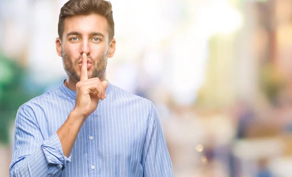 Young Handsome Man Isolated Background Asking Quiet Finger Lips Silence — Stock Photo, Image