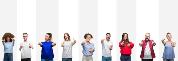 不同民族的年轻人在白色条纹孤立的背景下赞成用手做积极的手势 竖起大拇指微笑 为成功而高兴 看着镜头 赢家的手势 — 图库照片