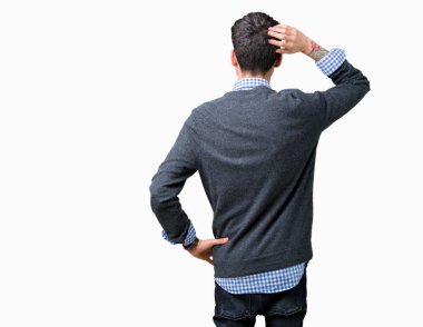 Genç yakışıklı izole arka plan geriye düşünme hakkında şüphe ile baş taraftan üzerinde gözlük takan adam akıllı