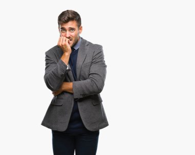 Genç yakışıklı iş adamı stresli ve gergin elle çivi ısırma ağzına bakarak izole arka plan üzerinde. Anksiyete sorunu.